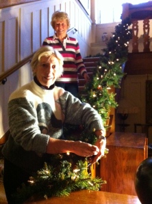Jan and Sue decorating the Stairs this morning